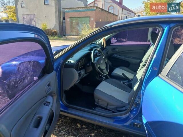 Синий Ниссан Альмера Классик, объемом двигателя 1.6 л и пробегом 221 тыс. км за 4500 $, фото 2 на Automoto.ua