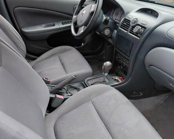 Синий Ниссан Альмера Классик, объемом двигателя 1.6 л и пробегом 218 тыс. км за 4800 $, фото 12 на Automoto.ua