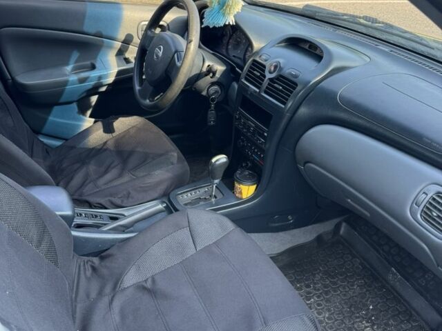 Синий Ниссан Альмера Классик, объемом двигателя 1.6 л и пробегом 170 тыс. км за 3900 $, фото 4 на Automoto.ua