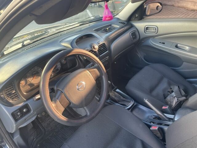 Синій Ніссан Альмера Класік, об'ємом двигуна 1.6 л та пробігом 253 тис. км за 4700 $, фото 6 на Automoto.ua