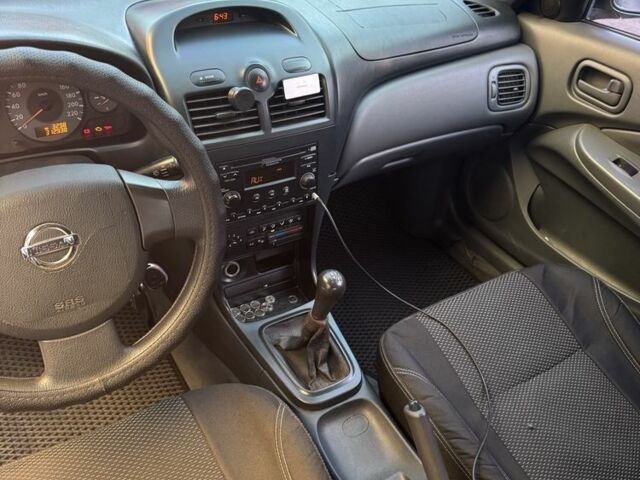 Синий Ниссан Альмера Классик, объемом двигателя 1.6 л и пробегом 310 тыс. км за 3500 $, фото 5 на Automoto.ua