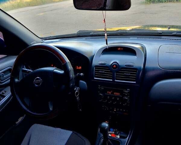 Синій Ніссан Альмера Класік, об'ємом двигуна 1.6 л та пробігом 257 тис. км за 3900 $, фото 16 на Automoto.ua