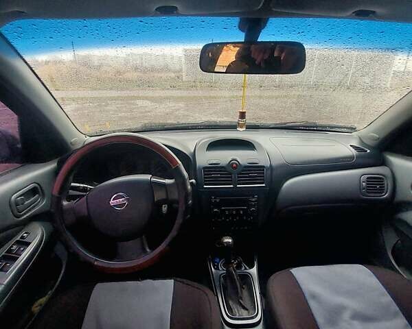 Синий Ниссан Альмера Классик, объемом двигателя 1.6 л и пробегом 257 тыс. км за 3850 $, фото 10 на Automoto.ua