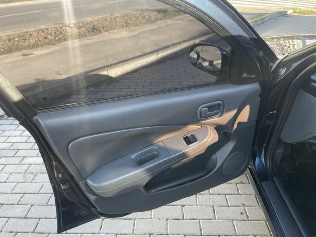 Синій Ніссан Альмера Класік, об'ємом двигуна 1.6 л та пробігом 253 тис. км за 4700 $, фото 7 на Automoto.ua
