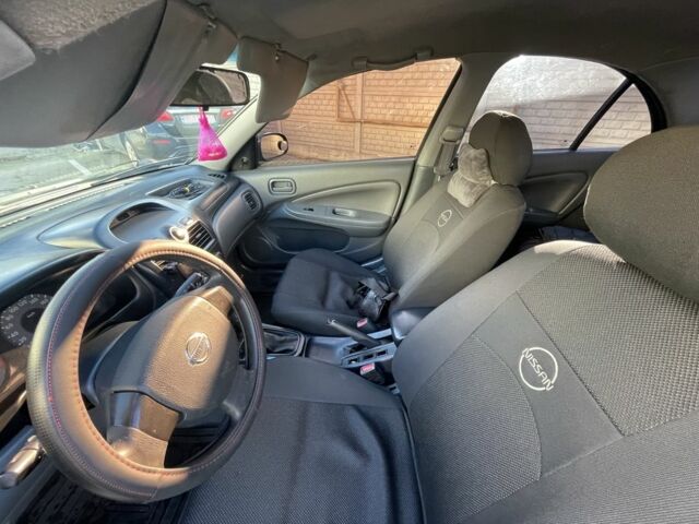 Синій Ніссан Альмера Класік, об'ємом двигуна 1.6 л та пробігом 253 тис. км за 4700 $, фото 9 на Automoto.ua