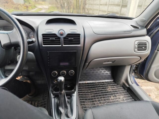 Синій Ніссан Альмера Класік, об'ємом двигуна 1.6 л та пробігом 190 тис. км за 4800 $, фото 5 на Automoto.ua