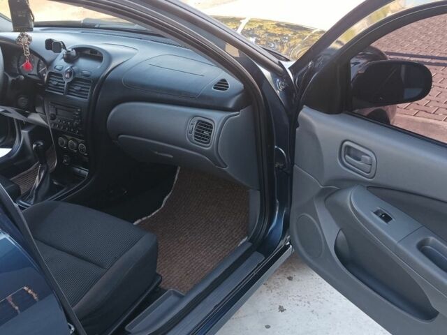 Синий Ниссан Альмера Классик, объемом двигателя 1.6 л и пробегом 227 тыс. км за 4500 $, фото 11 на Automoto.ua