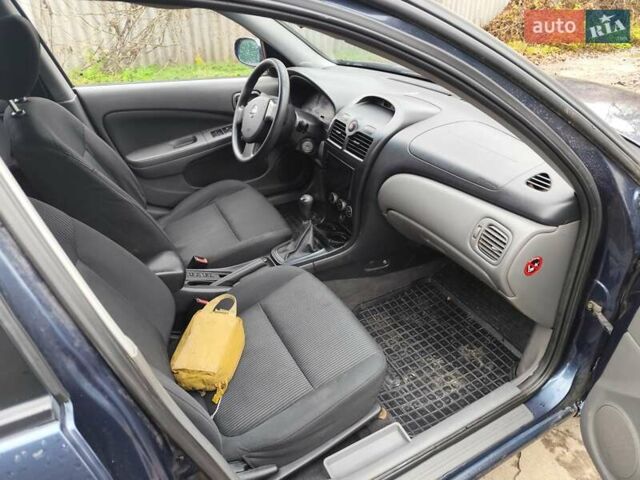 Синій Ніссан Альмера Класік, об'ємом двигуна 1.6 л та пробігом 191 тис. км за 4200 $, фото 11 на Automoto.ua