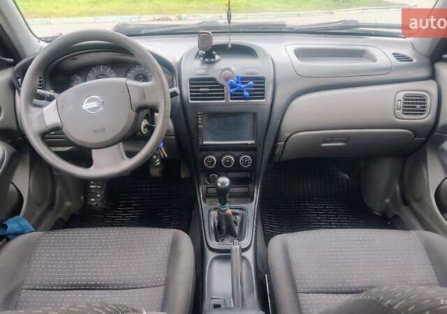 Синій Ніссан Альмера Класік, об'ємом двигуна 1.6 л та пробігом 210 тис. км за 4800 $, фото 7 на Automoto.ua