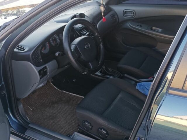 Синий Ниссан Альмера Классик, объемом двигателя 1.6 л и пробегом 227 тыс. км за 4500 $, фото 12 на Automoto.ua