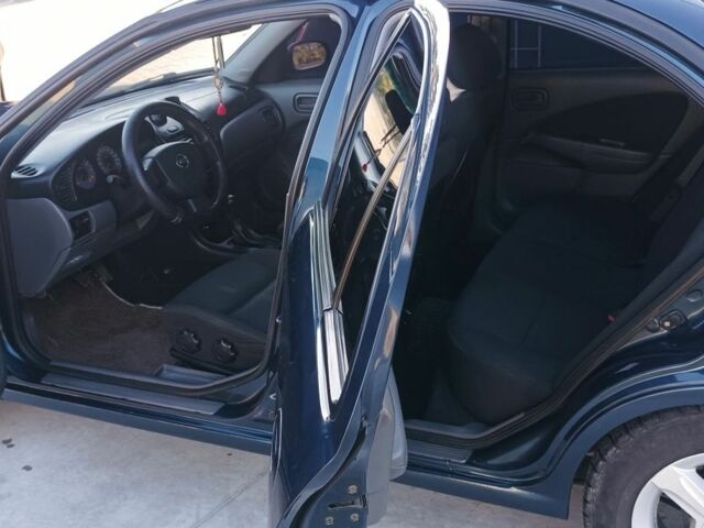 Синий Ниссан Альмера Классик, объемом двигателя 1.6 л и пробегом 227 тыс. км за 4500 $, фото 10 на Automoto.ua