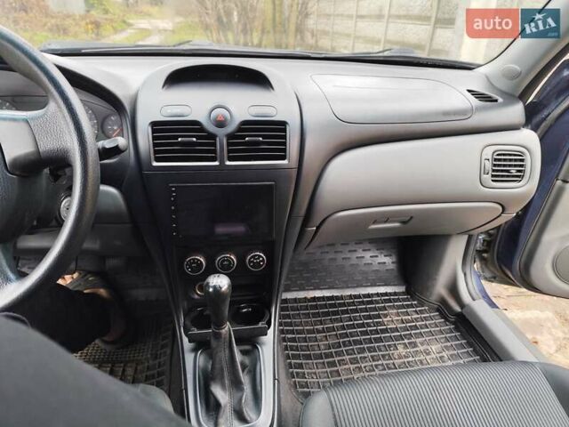 Синій Ніссан Альмера Класік, об'ємом двигуна 1.6 л та пробігом 191 тис. км за 4200 $, фото 4 на Automoto.ua