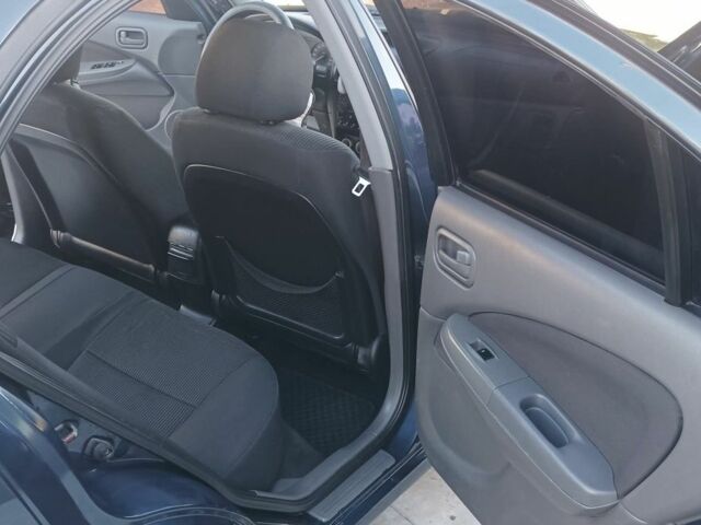 Синий Ниссан Альмера Классик, объемом двигателя 1.6 л и пробегом 227 тыс. км за 4500 $, фото 14 на Automoto.ua