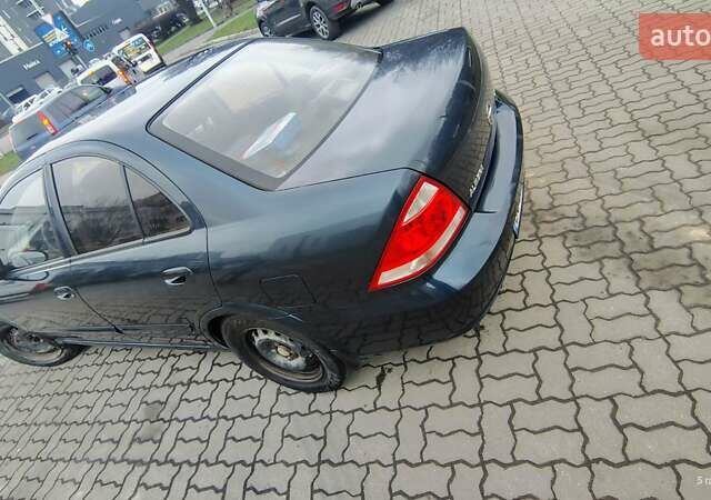 Синій Ніссан Альмера Класік, об'ємом двигуна 1.6 л та пробігом 210 тис. км за 4800 $, фото 5 на Automoto.ua