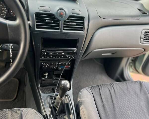 Зеленый Ниссан Альмера Классик, объемом двигателя 1.6 л и пробегом 96 тыс. км за 5700 $, фото 4 на Automoto.ua