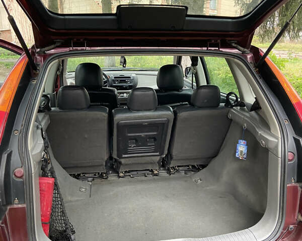 Красный Ниссан Альмера Тино, объемом двигателя 1.77 л и пробегом 226 тыс. км за 3552 $, фото 20 на Automoto.ua