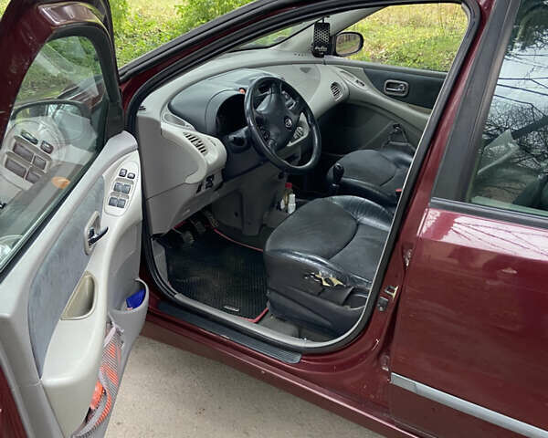 Красный Ниссан Альмера Тино, объемом двигателя 1.77 л и пробегом 226 тыс. км за 3552 $, фото 12 на Automoto.ua