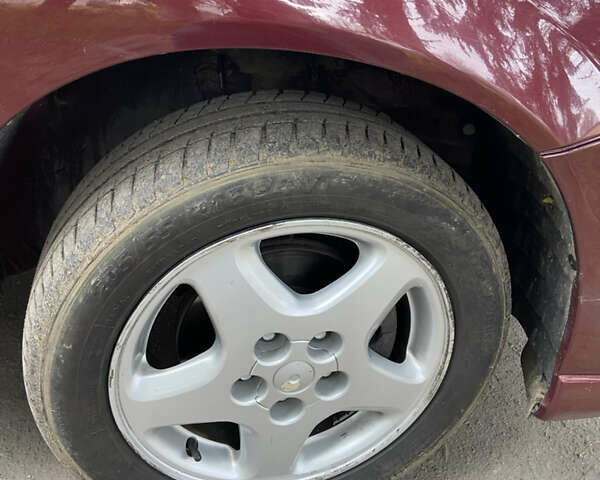 Красный Ниссан Альмера Тино, объемом двигателя 1.77 л и пробегом 226 тыс. км за 3552 $, фото 26 на Automoto.ua