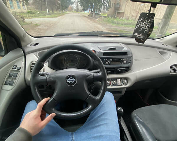 Красный Ниссан Альмера Тино, объемом двигателя 1.77 л и пробегом 226 тыс. км за 3552 $, фото 14 на Automoto.ua