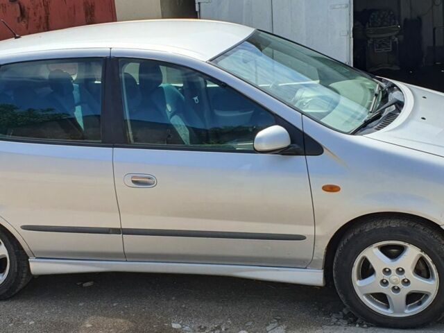 Сірий Ніссан Альмера Тіна, об'ємом двигуна 1.8 л та пробігом 230 тис. км за 2900 $, фото 2 на Automoto.ua