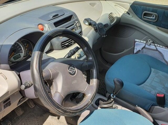 Сірий Ніссан Альмера Тіна, об'ємом двигуна 1.8 л та пробігом 230 тис. км за 2900 $, фото 4 на Automoto.ua
