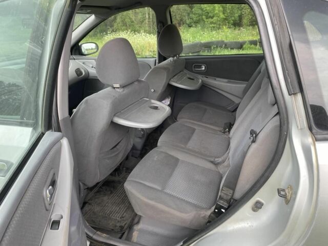 Серый Ниссан Альмера Тино, объемом двигателя 1.8 л и пробегом 370 тыс. км за 2600 $, фото 6 на Automoto.ua