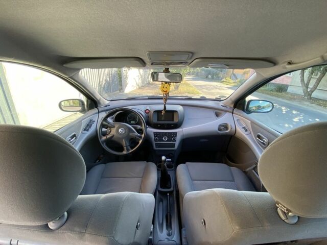 Серый Ниссан Альмера Тино, объемом двигателя 1.8 л и пробегом 185 тыс. км за 5300 $, фото 6 на Automoto.ua