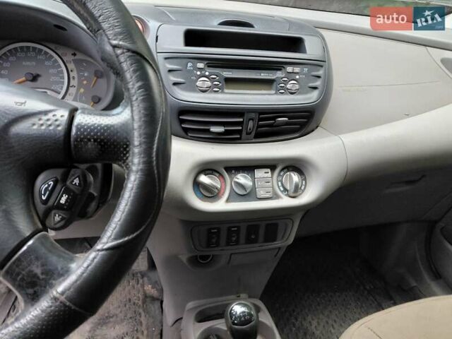 Зелений Ніссан Альмера Тіна, об'ємом двигуна 1.8 л та пробігом 190 тис. км за 2500 $, фото 8 на Automoto.ua
