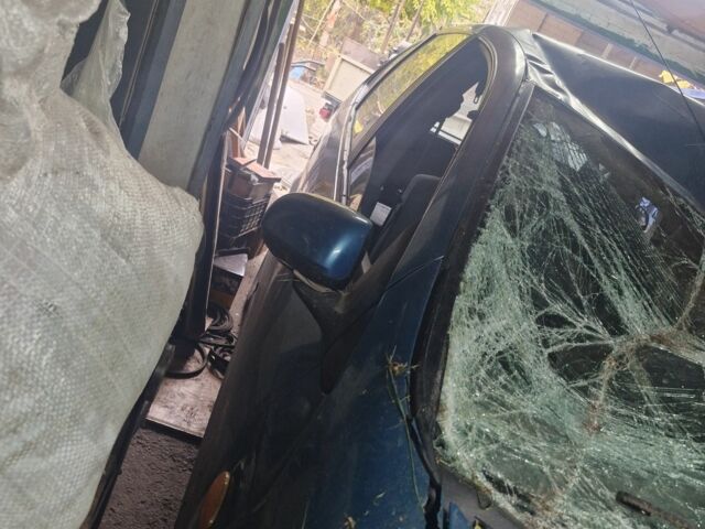 Зелений Ніссан Альмера Тіна, об'ємом двигуна 2 л та пробігом 101 тис. км за 1000 $, фото 7 на Automoto.ua