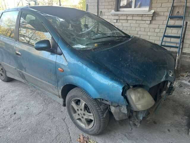 Зелений Ніссан Альмера Тіна, об'ємом двигуна 2 л та пробігом 101 тис. км за 1000 $, фото 1 на Automoto.ua