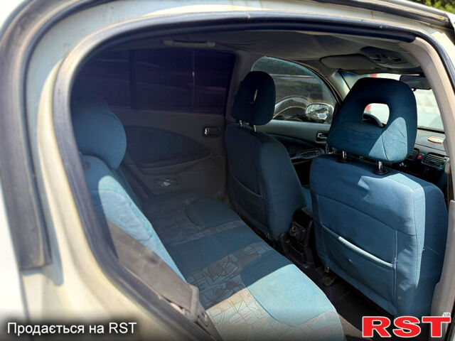 Білий Ніссан Альмера, об'ємом двигуна 1.8 л та пробігом 198 тис. км за 2500 $, фото 8 на Automoto.ua