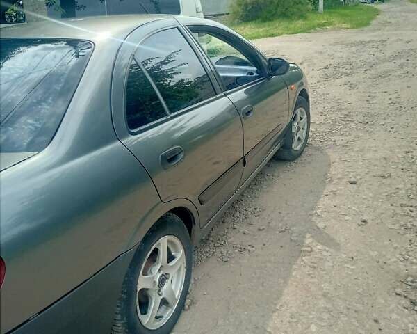 Белый Ниссан Альмера, объемом двигателя 1.5 л и пробегом 180 тыс. км за 2500 $, фото 2 на Automoto.ua