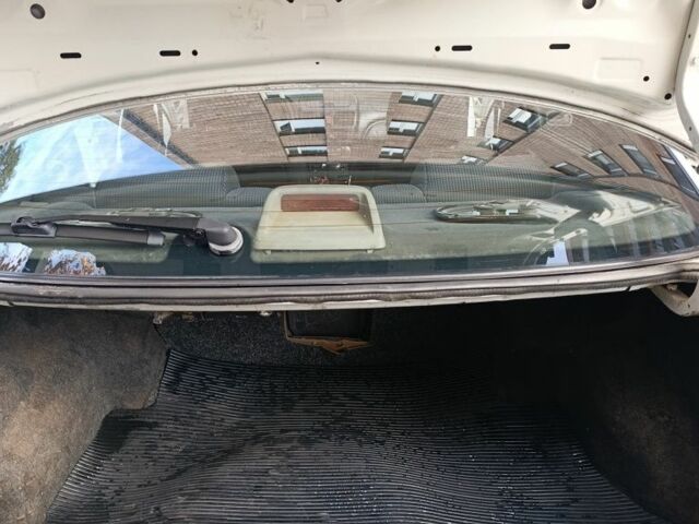 Белый Ниссан Альмера, объемом двигателя 1.8 л и пробегом 214 тыс. км за 3088 $, фото 5 на Automoto.ua