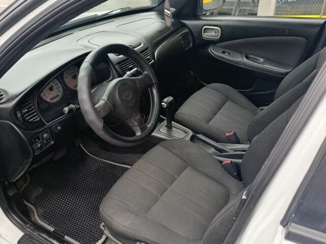 Белый Ниссан Альмера, объемом двигателя 1.8 л и пробегом 214 тыс. км за 3088 $, фото 2 на Automoto.ua