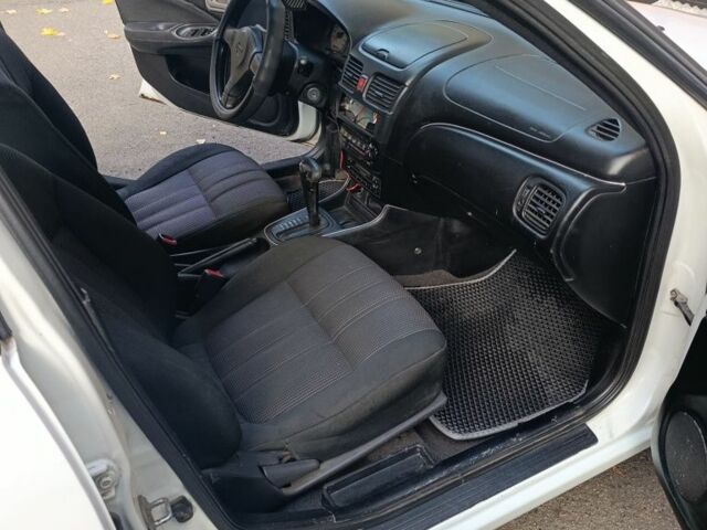 Белый Ниссан Альмера, объемом двигателя 1.8 л и пробегом 214 тыс. км за 3088 $, фото 3 на Automoto.ua