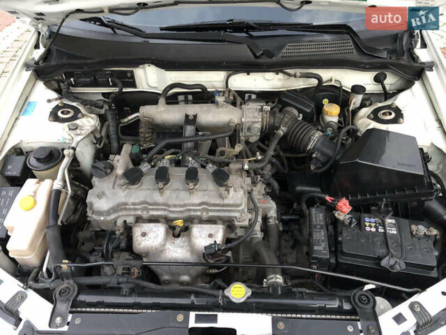 Белый Ниссан Альмера, объемом двигателя 1.6 л и пробегом 187 тыс. км за 5300 $, фото 41 на Automoto.ua