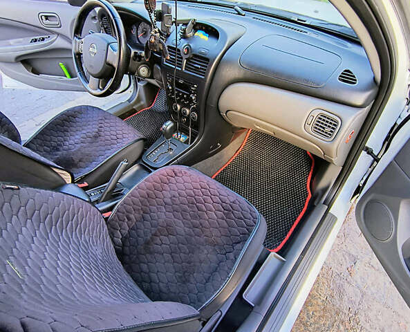 Белый Ниссан Альмера, объемом двигателя 1.6 л и пробегом 144 тыс. км за 6200 $, фото 11 на Automoto.ua