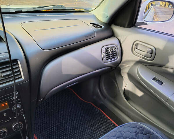 Белый Ниссан Альмера, объемом двигателя 1.6 л и пробегом 144 тыс. км за 6200 $, фото 9 на Automoto.ua