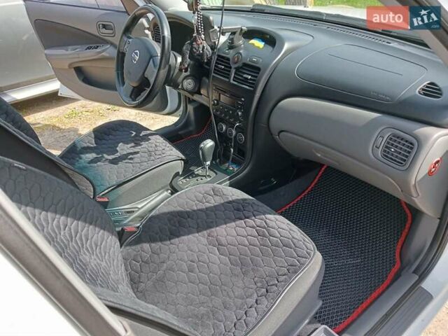 Белый Ниссан Альмера, объемом двигателя 1.6 л и пробегом 140 тыс. км за 6300 $, фото 5 на Automoto.ua
