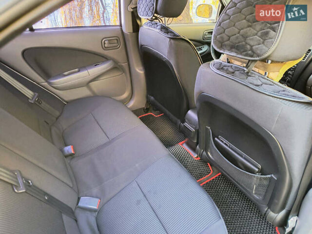 Белый Ниссан Альмера, объемом двигателя 1.6 л и пробегом 144 тыс. км за 6200 $, фото 15 на Automoto.ua