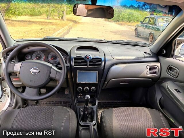 Белый Ниссан Альмера, объемом двигателя 1.6 л и пробегом 262 тыс. км за 6500 $, фото 2 на Automoto.ua