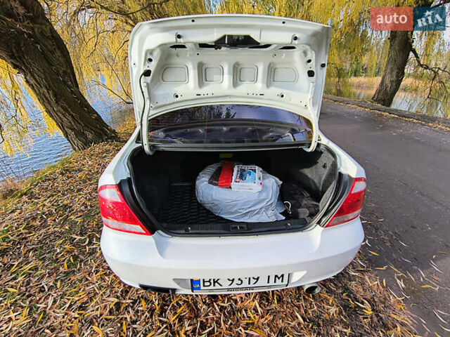 Белый Ниссан Альмера, объемом двигателя 1.6 л и пробегом 144 тыс. км за 6200 $, фото 20 на Automoto.ua