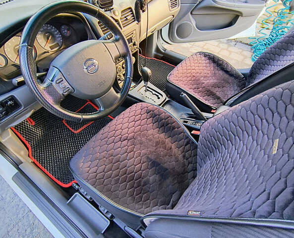 Белый Ниссан Альмера, объемом двигателя 1.6 л и пробегом 144 тыс. км за 6200 $, фото 10 на Automoto.ua