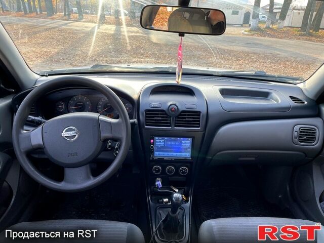 Белый Ниссан Альмера, объемом двигателя 1.6 л и пробегом 330 тыс. км за 3799 $, фото 11 на Automoto.ua