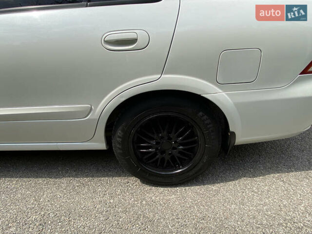 Белый Ниссан Альмера, объемом двигателя 1.6 л и пробегом 207 тыс. км за 5500 $, фото 7 на Automoto.ua