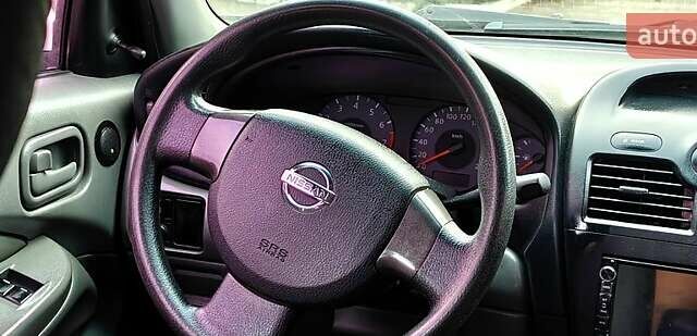 Белый Ниссан Альмера, объемом двигателя 1.6 л и пробегом 212 тыс. км за 4600 $, фото 6 на Automoto.ua