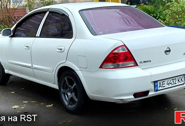 Белый Ниссан Альмера, объемом двигателя 1.6 л и пробегом 212 тыс. км за 4600 $, фото 5 на Automoto.ua