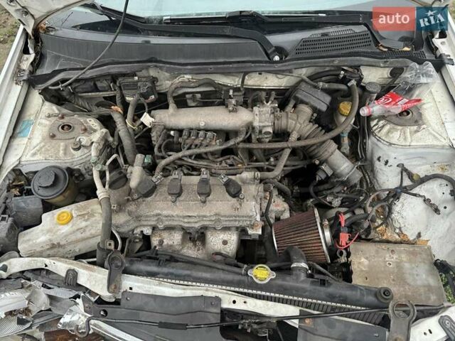 Белый Ниссан Альмера, объемом двигателя 1.6 л и пробегом 200 тыс. км за 1650 $, фото 6 на Automoto.ua