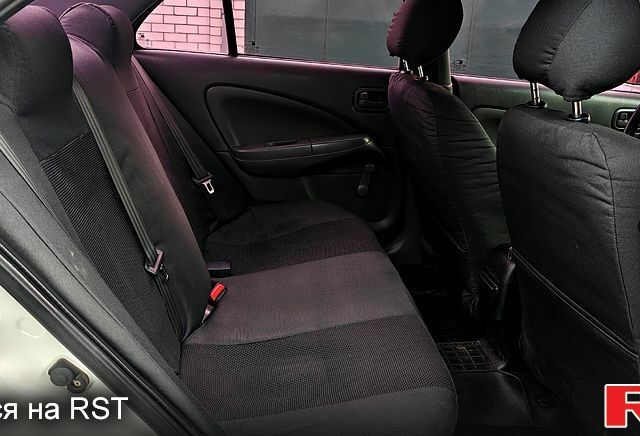 Белый Ниссан Альмера, объемом двигателя 1.6 л и пробегом 212 тыс. км за 4600 $, фото 11 на Automoto.ua