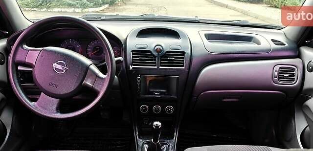 Белый Ниссан Альмера, объемом двигателя 1.6 л и пробегом 212 тыс. км за 4600 $, фото 7 на Automoto.ua